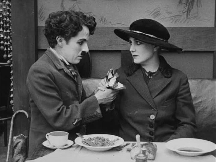 Charles Chaplin and Edna Purviance in The Immigrant (1917)