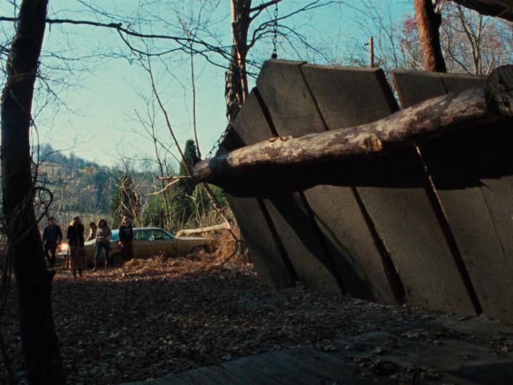 Betsy Baker, Bruce Campbell, Richard DeManincor, Ellen Sandweiss, and Theresa Tilly in The Evil Dead (1981)