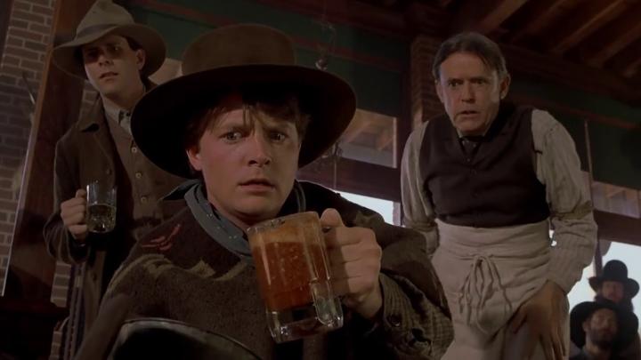 Michael J. Fox and Matt Clark in Back to the Future Part III (1990)