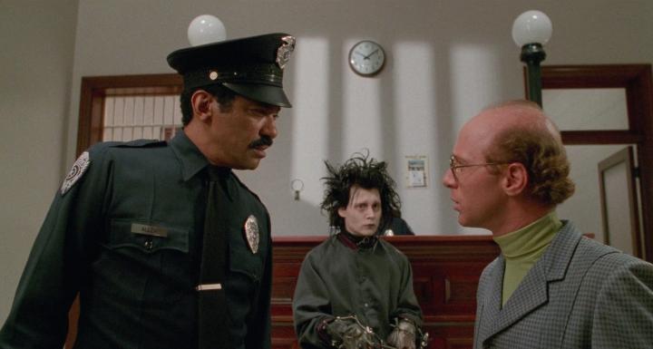 Johnny Depp, Aaron Lustig, and Dick Anthony Williams in Edward Scissorhands (1990)