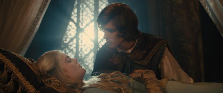 Elle Fanning and Brenton Thwaites in Maleficent (2014)