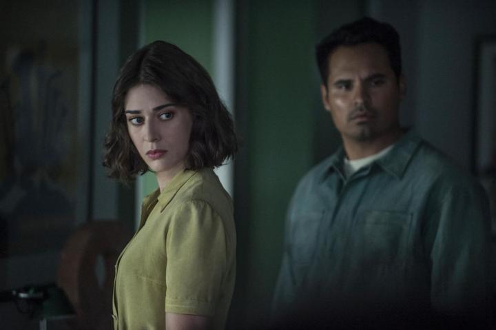 Lizzy Caplan and Michael Peña in Extinction (2018)