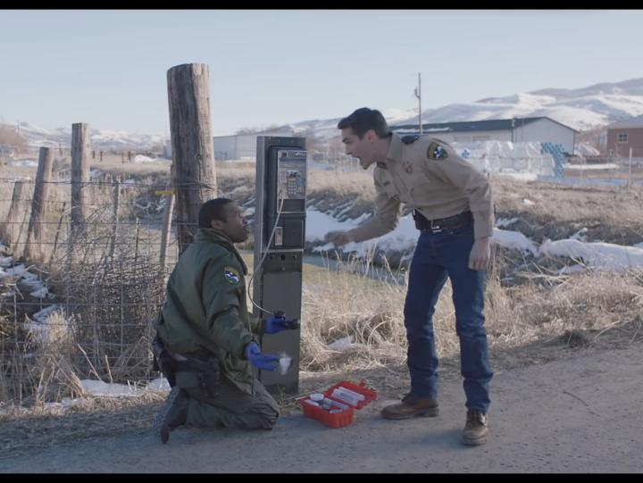 Jim Cummings and Demetrius Daniels in The Wolf of Snow Hollow (2020)