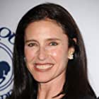 Mimi Rogers به عنوان Lois Palmer