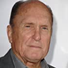 Robert Duvall به عنوان Rex Merrick