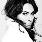 Michelle Forbes به عنوان Ellen Becker