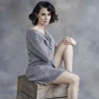 Mia Kirshner به عنوان Susan