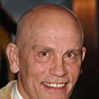 John Malkovich به عنوان Osborne Cox