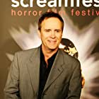 Jeffrey Combs به عنوان Kevin Burkhoff