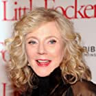 Blythe Danner به عنوان Ms. Perkins