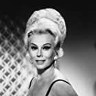 Eva Gabor به عنوان Liane d'Exelmans