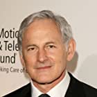 Victor Garber به عنوان Ken Taylor