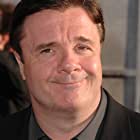 Nathan Lane به عنوان Lewis Michener