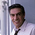 Jerry Orbach به عنوان Jake Houseman