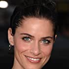 Amanda Peet به عنوان Beth Gallagher