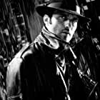 Robert Rodriguez به عنوان Dokk Strassi