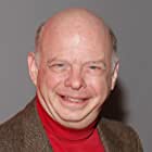 Wallace Shawn به عنوان Mr. Woodley