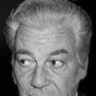 Cesar Romero به عنوان Duke Santos