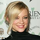 Amy Smart به عنوان Tracy Faucet