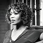 Alfre Woodard به عنوان Augustine James