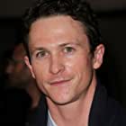 Jonathan Tucker به عنوان Tim Weiner