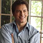 John Barrowman به عنوان Malcolm Merlyn