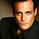 Brian Bloom به عنوان Adam Strange