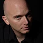 Michael Cerveris به عنوان Assistant Director Gunn