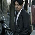 Chang Chen به عنوان Dr. Wellington Yueh