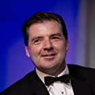 Brendan Coyle به عنوان NicholHiggins