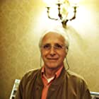 Ruggero Deodato به عنوان Man sitting in NYU Campus