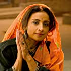 Divya Dutta به عنوان Isri Kaur (Milkha's elder sister)