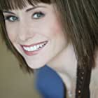 Susan Egan به عنوان Tracy Hansen