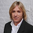 Ron Eldard به عنوان Dodge