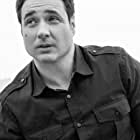 Adam Ferrara به عنوان Sergeant Howard