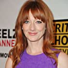 Judy Greer به عنوان Lucy Wyman