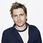 Sverrir Gudnason به عنوان Mikael Blomkvist