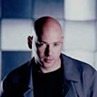 Evan Handler به عنوان Samuel Collins