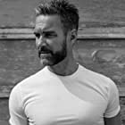 Jay Harrington به عنوان David 'Deacon' Kay