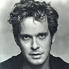 Tom Hollander به عنوان Lance Corkoran