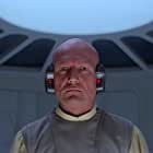 John Hollis به عنوان Lobot, Lando's Aide