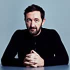 Ralph Ineson به عنوان Jim McAlester