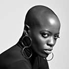 Florence Kasumba به عنوان Ayo