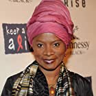 Angélique Kidjo به عنوان Ms. Thuli Kani