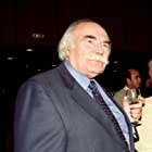 Nikos Kouros به عنوان Theater Owner