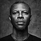 Phil LaMarr به عنوان Shark God