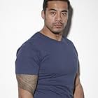 Robbie Magasiva به عنوان Harlan 'Sonny' Jennings