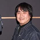 Yasunori Matsumoto به عنوان Nobisuke Nobi (Nobita's Father)