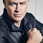 Neal McDonough به عنوان The Benefactor