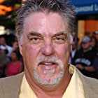 Bruce McGill به عنوان Ron Motley